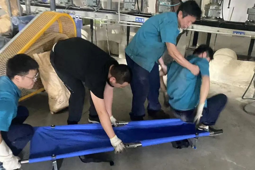 O poliéster Changshu realiza un simulacro de rescate de emerxencia para golpe de calor causado por alta temperatura